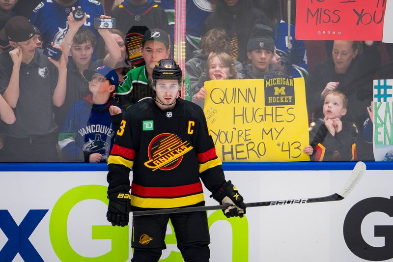 Jan 27, 2024; Vancouver, British Columbia, CAN; Vancouver Canucks defenseman Quinn Hughes (43) rests  during warm up prior to a game against the Columbus Blue Jackets at Rogers Arena. Mandatory Credit: Bob Frid-USA TODAY Sports