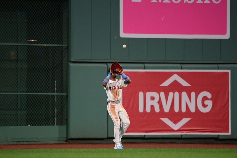 Jun 16, 2024; Boston, Massachusetts, USA; Boston Red Sox center fielder Ceddanne Rafaela (43) makes a catch to end the seventh inning against the New York Yankees at Fenway Park. Mandatory Credit: Eric Canha-USA TODAY Sports