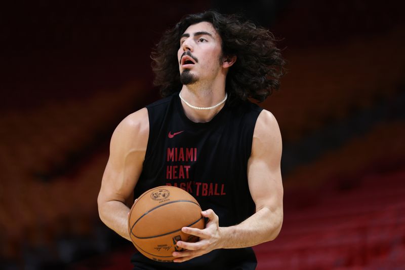 MIAMI, FLORIDA - FEBRUARY 07: Jaime Jaquez Jr. #11 of the Miami Heat warms up prior to a game against the San Antonio Spurs at Kaseya Center on February 07, 2024 in Miami, Florida. NOTE TO USER: User expressly acknowledges and agrees that, by downloading and or using this photograph, User is consenting to the terms and conditions of the Getty Images License Agreement. (Photo by Megan Briggs/Getty Images)