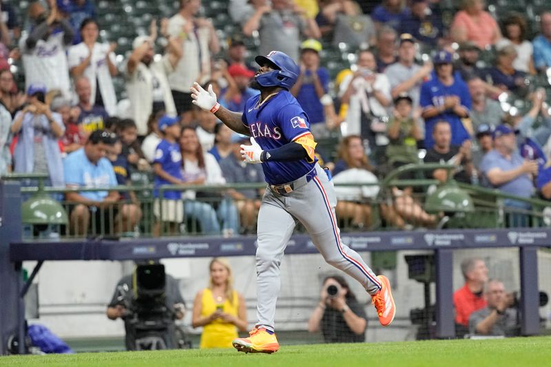 Jun 24, 2024; Milwaukee, Wisconsin, USA;  Texas Rangers right fielder Adolis Garcia (53) rounds the bases after hitting a home run during the sixth inning against the Milwaukee Brewers at American Family Field. Mandatory Credit: Jeff Hanisch-USA TODAY Sports