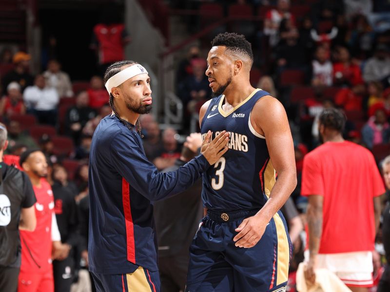 CHICAGO, IL - OCTOBER 4: Jose Alvarado #15 hi-fives CJ McCollum #3 of the New Orleans Pelicans during the game against the Chicago Bulls on October 4, 2022 at United Center in Chicago, Illinois. NOTE TO USER: User expressly acknowledges and agrees that, by downloading and or using this photograph, User is consenting to the terms and conditions of the Getty Images License Agreement. Mandatory Copyright Notice: Copyright 2022 NBAE (Photo by Jeff Haynes/NBAE via Getty Images)