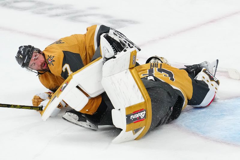 May 8, 2025; Las Vegas, Nevada, USA; Vegas Golden Knights defenseman Alex Pietrangelo (7) and goaltender Adin Hill (33) react after Edmonton Oilers center Leon Draisaitl (29) scored a game-winning goal during an overtime period to give the Oilers a 5-4 victory in game two of the second round of the 2025 Stanley Cup Playoffs at T-Mobile Arena. Mandatory Credit: Stephen R. Sylvanie-Imagn Images