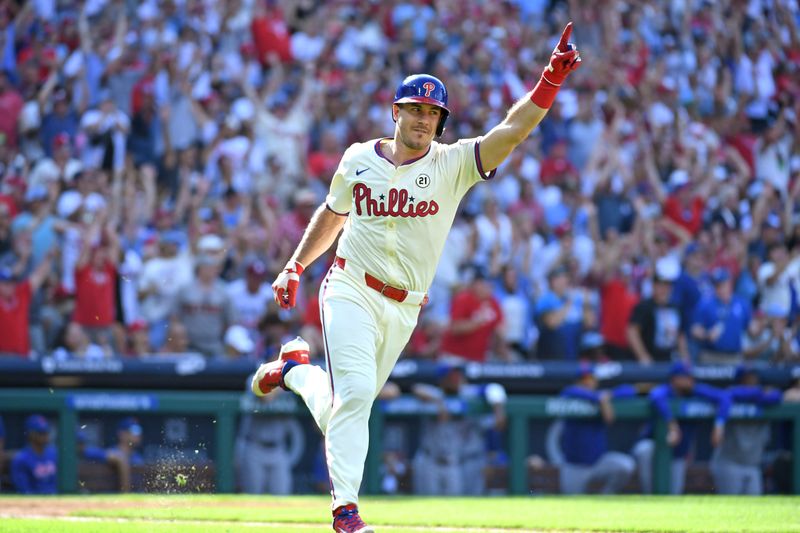 Sep 15, 2024; Philadelphia, Pennsylvania, Philadelphia Phillies catcher J.T. Realmuto (10) celebrates his walk-off RBI single during the ninth inning against the New York Mets USA; at Citizens Bank Park. Mandatory Credit: Eric Hartline-Imagn Images