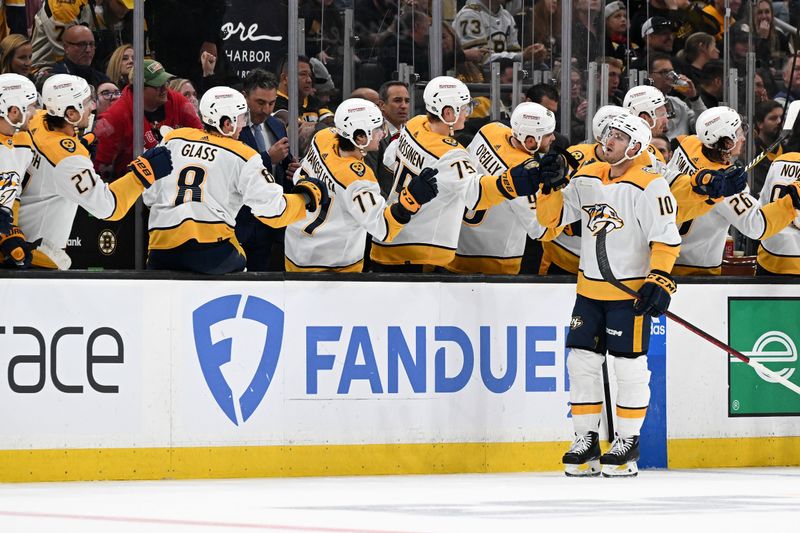 Oct 14, 2023; Boston, Massachusetts, USA; Nashville Predators center Colton Sissons (10) celebrates with his teammates after scoring a goal against the Boston Bruins during the second period at the TD Garden. Mandatory Credit: Brian Fluharty-USA TODAY Sports