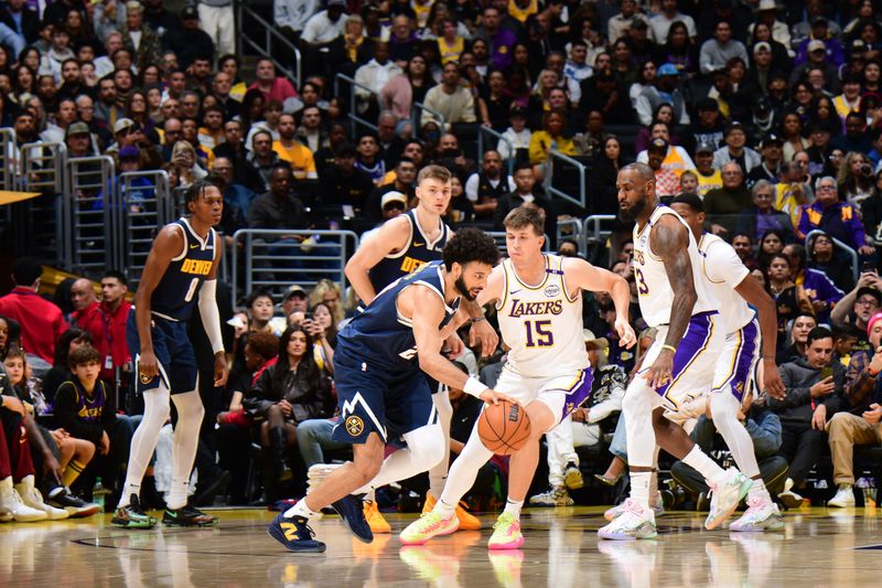 LOS ANGELES, CA - NOVEMBER 23: Jamal Murray #27 of the Denver Nuggets dribbles the ball during the game against the Los Angeles Lakers on November 23, 2024 at Crypto.Com Arena in Los Angeles, California. NOTE TO USER: User expressly acknowledges and agrees that, by downloading and/or using this Photograph, user is consenting to the terms and conditions of the Getty Images License Agreement. Mandatory Copyright Notice: Copyright 2024 NBAE (Photo by Adam Pantozzi/NBAE via Getty Images)