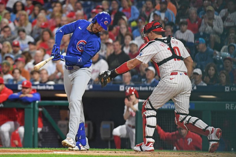 Sep 23, 2024; Philadelphia, Pennsylvania, USA; Chicago Cubs outfielder Cody Bellinger (24) is tagged out by Philadelphia Phillies catcher J.T. Realmuto (10) after striking out during the second inning at Citizens Bank Park. Mandatory Credit: Eric Hartline-Imagn Images