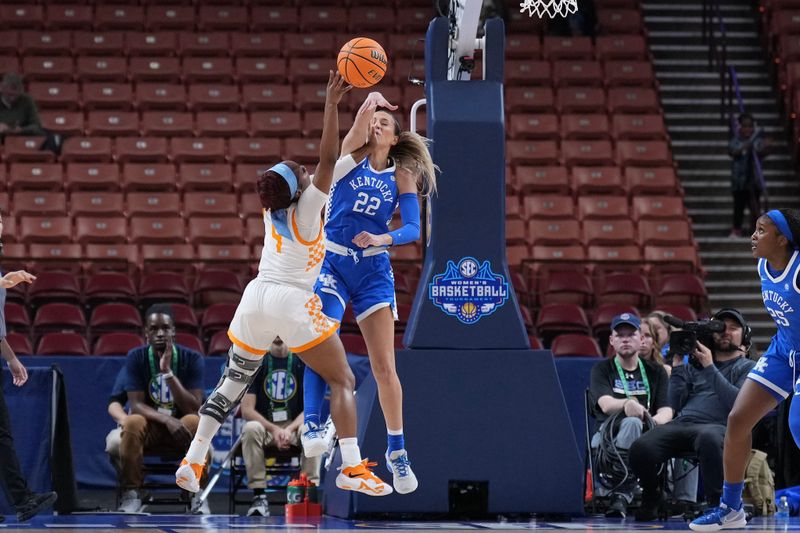 Mar 3, 2023; Greenville, SC, USA; Kentucky Wildcats guard Maddie Scherr (22) blocks the shot of Tennessee Lady Vols guard Jordan Walker (4) in the first quarter at Bon Secours Wellness Arena. Mandatory Credit: David Yeazell-USA TODAY Sports