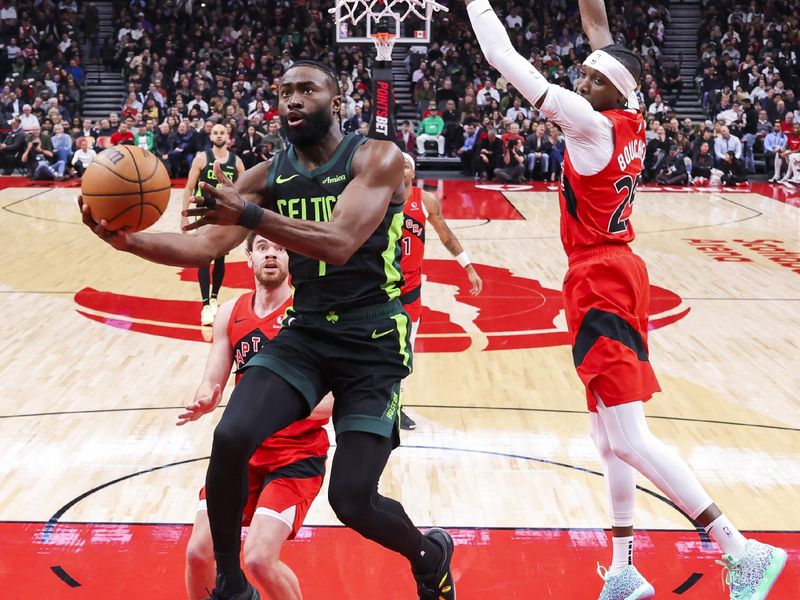 TORONTO, CANADA - JANUARY 15: Jaylen Brown #7 of the Boston Celtics drives to the basket during the game against the Toronto Raptors on January 15, 2025 at the Scotiabank Arena in Toronto, Ontario, Canada.  NOTE TO USER: User expressly acknowledges and agrees that, by downloading and or using this Photograph, user is consenting to the terms and conditions of the Getty Images License Agreement.  Mandatory Copyright Notice: Copyright 2025 NBAE (Photo by Vaughn Ridley/NBAE via Getty Images)