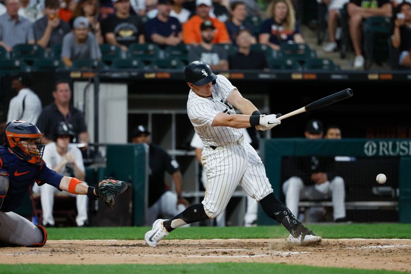Jun 18, 2024; Chicago, Illinois, USA; Chicago White Sox first baseman Andrew Vaughn (25) grounds into force out against the Houston Astros during the fifth inning at Guaranteed Rate Field. Mandatory Credit: Kamil Krzaczynski-USA TODAY Sports
