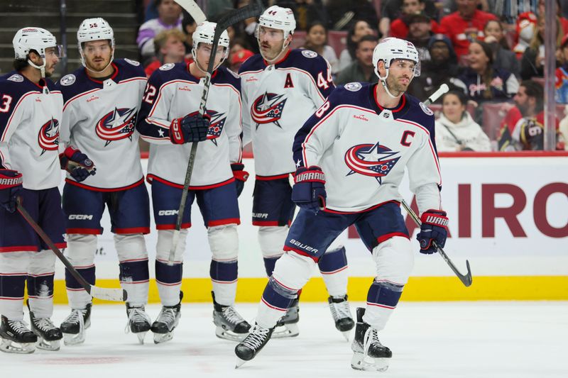 Nov 6, 2023; Sunrise, Florida, USA; Columbus Blue Jackets center Boone Jenner (38) looks on after scoring against the Florida Panthers during the first period at Amerant Bank Arena. Mandatory Credit: Sam Navarro-USA TODAY Sports