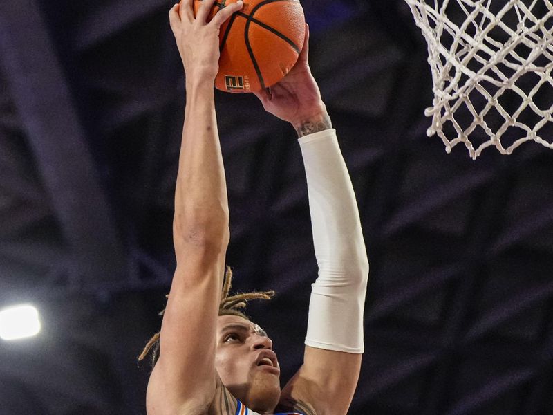 Feb 28, 2023; Athens, Georgia, USA; Florida Gators guard Riley Kugel (24) goes in to dunk the ball against the Georgia Bulldogs during the first half at Stegeman Coliseum. Mandatory Credit: Dale Zanine-USA TODAY Sports