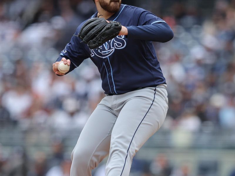 Apr 21, 2024; Bronx, New York, USA; Tampa Bay Rays starting pitcher Aaron Civale (34) pitches against the New York Yankees during the first inning at Yankee Stadium. Mandatory Credit: Brad Penner-USA TODAY Sports