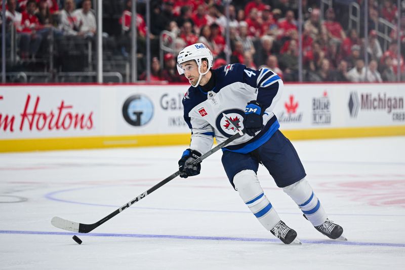 Oct 30, 2024; Detroit, Michigan, USA; Winnipeg Jets defenseman Neal Pink (4) during the third period against the Detroit Red Wings at Little Caesars Arena. Mandatory Credit: Tim Fuller-Imagn Images