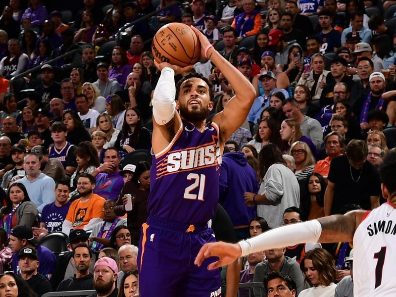 PHOENIX, AZ - NOVEMBER 2: Tyus Jones #21 of the Phoenix Suns shoots a three point basket during the game against the Portland Trail Blazers on November 2, 2024 at Footprint Center in Phoenix, Arizona. NOTE TO USER: User expressly acknowledges and agrees that, by downloading and or using this photograph, user is consenting to the terms and conditions of the Getty Images License Agreement. Mandatory Copyright Notice: Copyright 2024 NBAE (Photo by Kate Frese/NBAE via Getty Images)