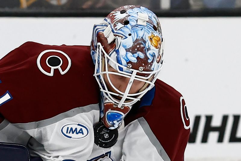 Oct 25, 2025; Boston, Massachusetts, USA; Colorado Avalanche goaltender Scott Wedgewood (41) makes a save up near his chin during the second period against the Boston Bruins at TD Garden. Mandatory Credit: Winslow Townson-Imagn Images
