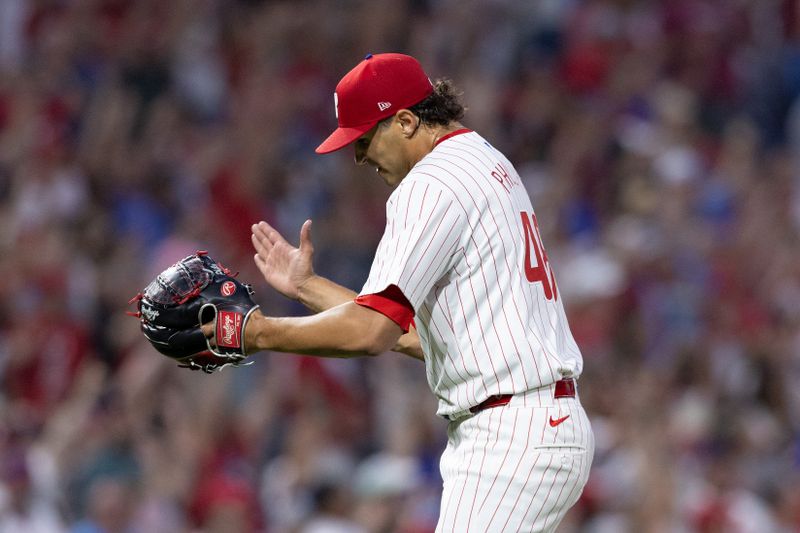 Jul 27, 2024; Philadelphia, Pennsylvania, USA;  Philadelphia Phillies pitcher Tyler Phillips (48) reacts after a no run complete game victory against the Cleveland Guardians at Citizens Bank Park. Mandatory Credit: Bill Streicher-USA TODAY Sports