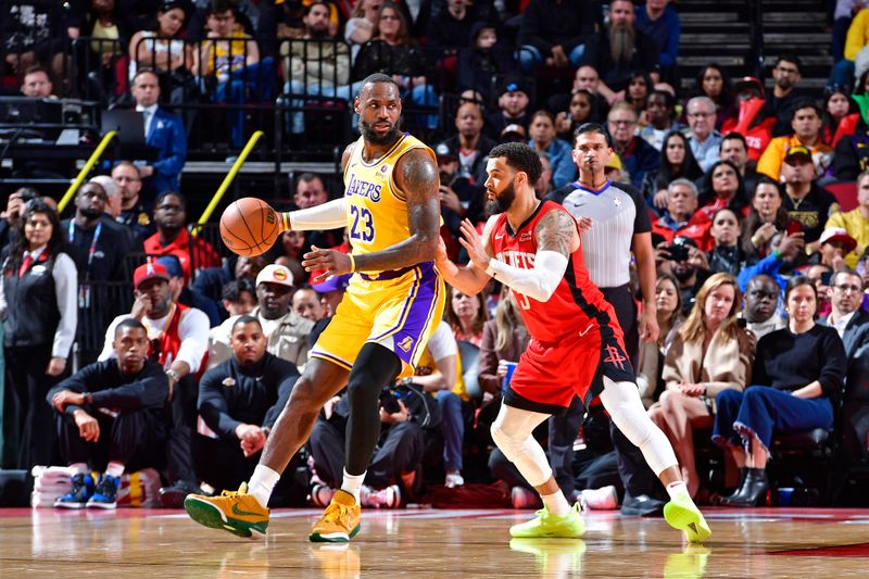 HOUSTON, TX - JANUARY 29:  LeBron James #23 of the Los Angeles Lakers dribbles the ball during the game against the Houston Rockets on January 29, 2024 at the Toyota Center in Houston, Texas. NOTE TO USER: User expressly acknowledges and agrees that, by downloading and or using this photograph, User is consenting to the terms and conditions of the Getty Images License Agreement. Mandatory Copyright Notice: Copyright 2024 NBAE (Photo by Logan Riely/NBAE via Getty Images)