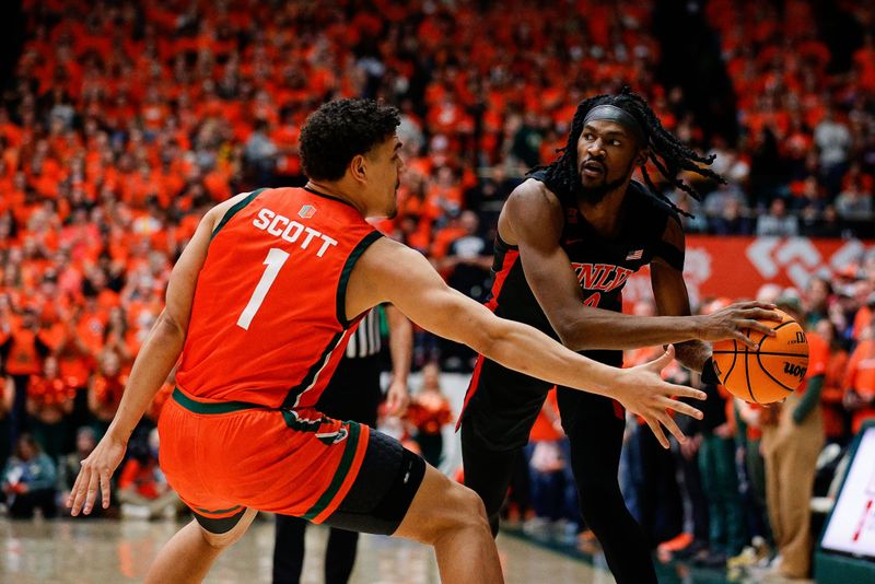 Jan 19, 2024; Fort Collins, Colorado, USA; UNLV Rebels forward Keylan Boone (20) controls the ball as Colorado State Rams forward Joel Scott (1) guards in the first half at Moby Arena. Mandatory Credit: Isaiah J. Downing-USA TODAY Sports