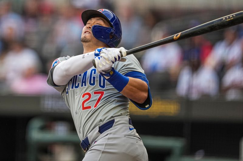 May 14, 2024; Cumberland, Georgia, USA; Chicago Cubs right fielder Seiya Suzuki (27) strikes out against the Atlanta Braves during the first inning at Truist Park. Mandatory Credit: Dale Zanine-USA TODAY Sports