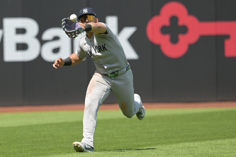 Apr 23, 2025; Cleveland, Ohio, USA; New York Yankees left fielder Jasson Dominguez (24) catches a ball hit by Cleveland Guardians left fielder Steven Kwan (not pictured) during the second inning at Progressive Field. Mandatory Credit: Ken Blaze-Imagn Images