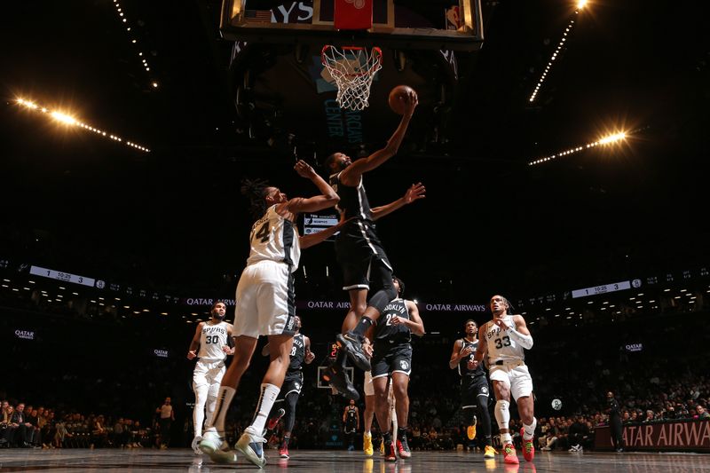 BROOKLYN, NY - FEBRUARY 10: Mikal Bridges #1 of the Brooklyn Nets drives to the basket during the game against the San Antonio Spurs on February 10, 2024 at Barclays Center in Brooklyn, New York. NOTE TO USER: User expressly acknowledges and agrees that, by downloading and or using this Photograph, user is consenting to the terms and conditions of the Getty Images License Agreement. Mandatory Copyright Notice: Copyright 2024 NBAE (Photo by Nathaniel S. Butler/NBAE via Getty Images)