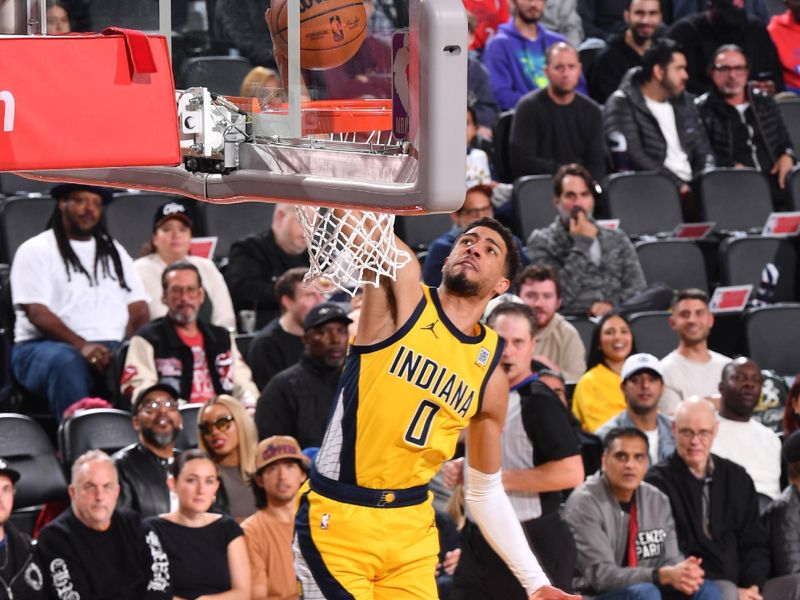 INGLEWOOD, CA - FEBRUARY 6: Tyrese Haliburton #0 of the Indiana Pacers dunks the ball during the game against the LA Clippers on February 6, 2025 at Intuit Dome in Los Angeles, California. NOTE TO USER: User expressly acknowledges and agrees that, by downloading and/or using this Photograph, user is consenting to the terms and conditions of the Getty Images License Agreement. Mandatory Copyright Notice: Copyright 2025 NBAE (Photo by Juan Ocampo/NBAE via Getty Images)