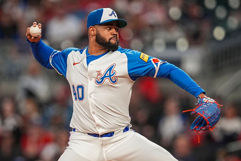 Sep 28, 2024; Cumberland, Georgia, USA; Atlanta Braves pitcher Reynaldo Lopez (40) pitches against the Kansas City Royals during the first inning at Truist Park. Mandatory Credit: Dale Zanine-Imagn Images