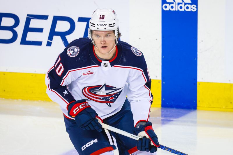 Jan 25, 2024; Calgary, Alberta, CAN; Columbus Blue Jackets left wing Dmitri Voronkov (10) skates during the warmup period against the Calgary Flames at Scotiabank Saddledome. Mandatory Credit: Sergei Belski-USA TODAY Sports