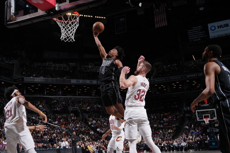 BROOKLYN, NY - FEBRUARY 8: Dennis Smith Jr. #4 of the Brooklyn Nets drives to the basket during the game against the Cleveland Cavaliers on February 8, 2024 at Barclays Center in Brooklyn, New York. NOTE TO USER: User expressly acknowledges and agrees that, by downloading and or using this Photograph, user is consenting to the terms and conditions of the Getty Images License Agreement. Mandatory Copyright Notice: Copyright 2024 NBAE (Photo by Jesse D. Garrabrant/NBAE via Getty Images)