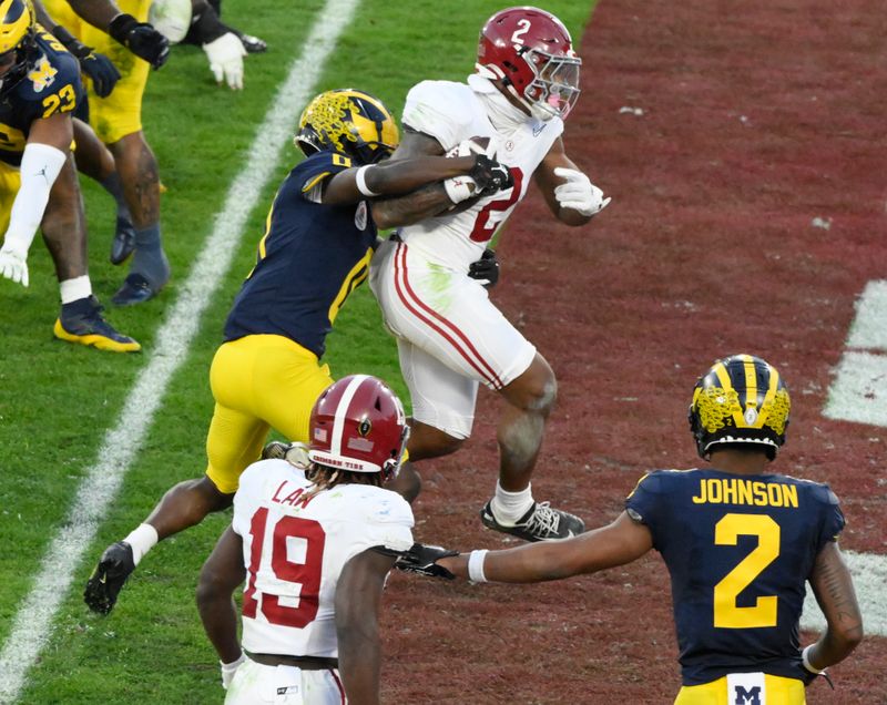 Jan 1, 2024; Pasadena, CA, USA; Alabama Crimson Tide running back Jase McClellan (2) scores a touchdown in the 4th quarter against the Michigan Wolverines in the 2024 Rose Bowl college football playoff semifinal game at Rose Bowl. Mandatory Credit: Robert Hanashiro-USA TODAY Sports