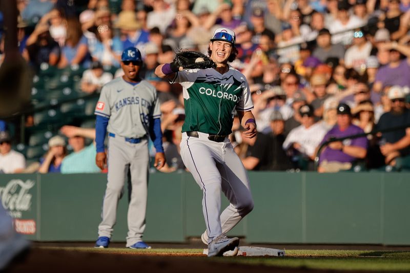 Jul 6, 2024; Denver, Colorado, USA; Colorado Rockies first baseman Michael Toglia (4) fields a throw in the sun in the second inning against the Kansas City Royals at Coors Field. Mandatory Credit: Isaiah J. Downing-USA TODAY Sports