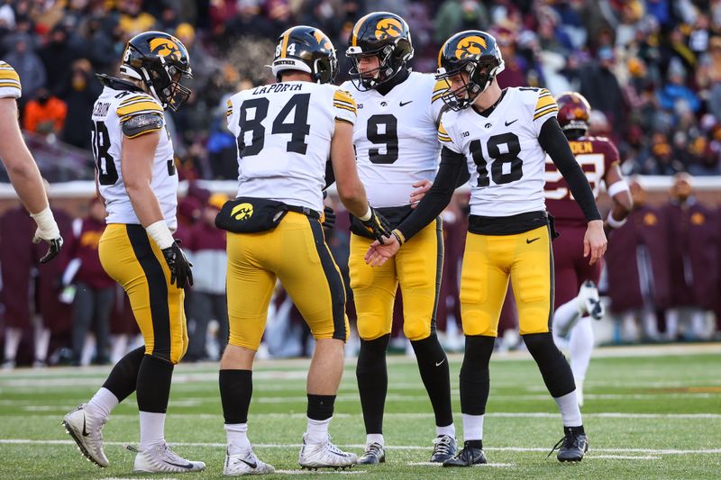 Nov 19, 2022; Minneapolis, Minnesota, USA; Iowa Hawkeyes place kicker Drew Stevens (18) celebrates a field goal against the Minnesota Golden Gophers during the first quarter at Huntington Bank Stadium. Mandatory Credit: Matt Krohn-USA TODAY Sports