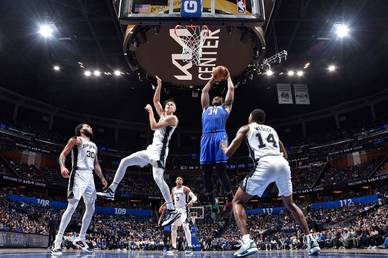 ORLANDO, FL - FEBRUARY 8: Wendell Carter Jr. #34 of the Orlando Magic dunks the ball during the game against the San Antonio Spurs on February 8, 2024 at the Kia Center in Orlando, Florida. NOTE TO USER: User expressly acknowledges and agrees that, by downloading and or using this photograph, User is consenting to the terms and conditions of the Getty Images License Agreement. Mandatory Copyright Notice: Copyright 2024 NBAE (Photo by Fernando Medina/NBAE via Getty Images)