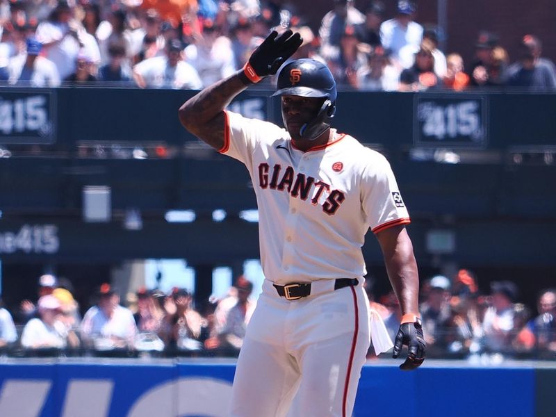 Jun 30, 2024; San Francisco, California, USA; San Francisco Giants designated hitter Jorge Soler (2) gestures at second base after hitting a double against the Los Angeles Dodgers during the first inning at Oracle Park. Mandatory Credit: Kelley L Cox-USA TODAY Sports