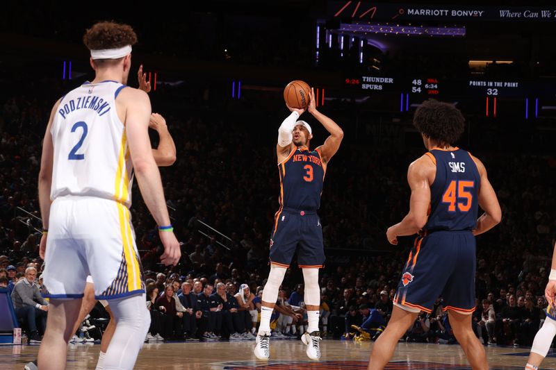 NEW YORK, NY - FEBRUARY 29: Josh Hart #3 of the New York Knicks shoots a three point basket against the Golden State Warriors on January 29, 2024 at Madison Square Garden in New York City, New York.  NOTE TO USER: User expressly acknowledges and agrees that, by downloading and or using this photograph, User is consenting to the terms and conditions of the Getty Images License Agreement. Mandatory Copyright Notice: Copyright 2024 NBAE  (Photo by Nathaniel S. Butler/NBAE via Getty Images)