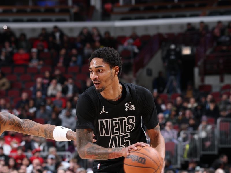 CHICAGO, IL - DECEMBER 2: Keon Johnson #45 of the Brooklyn Nets handles the ball during the game against the Chicago Bulls on December 2, 2024 at United Center in Chicago, Illinois. NOTE TO USER: User expressly acknowledges and agrees that, by downloading and or using this photograph, User is consenting to the terms and conditions of the Getty Images License Agreement. Mandatory Copyright Notice: Copyright 2024 NBAE (Photo by Jeff Haynes/NBAE via Getty Images)