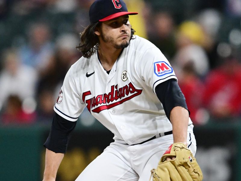 Sep 15, 2023; Cleveland, Ohio, USA; Cleveland Guardians relief pitcher Eli Morgan (49) throws a pitch during the ninth inning against the Texas Rangers at Progressive Field. Mandatory Credit: Ken Blaze-USA TODAY Sports