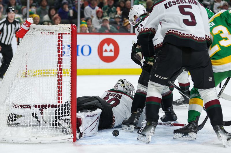 Jan 13, 2024; Saint Paul, Minnesota, USA; Arizona Coyotes goaltender Connor Ingram (39) makes a save against the Minnesota Wild during the second period at Xcel Energy Center. Mandatory Credit: Matt Krohn-USA TODAY Sports