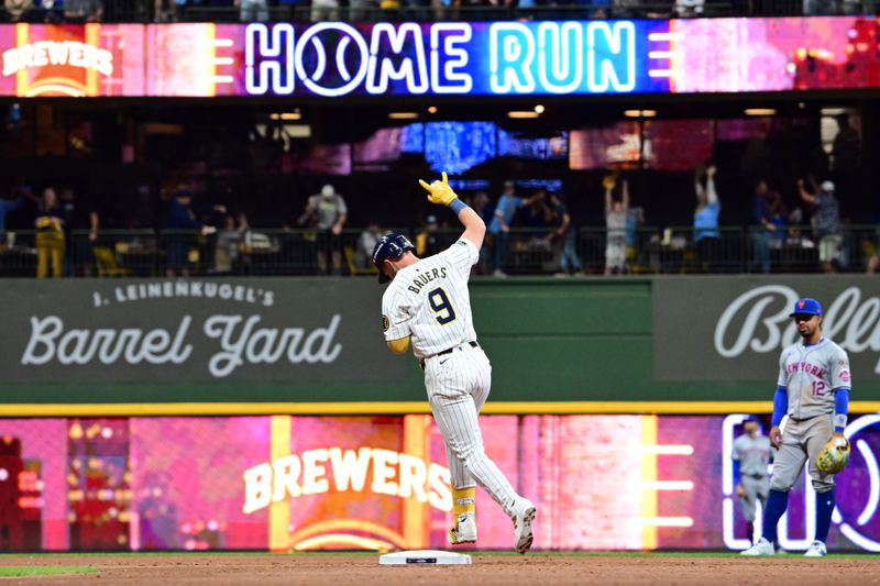 Oct 3, 2024; Milwaukee, Wisconsin, USA; Milwaukee Brewers pinch hitter Jake Bauers (9) runs after hitting a solo home run against the New York Mets in the seventh inning during game three of the Wildcard round for the 2024 MLB Playoffs at American Family Field. Mandatory Credit: Benny Sieu-Imagn Images