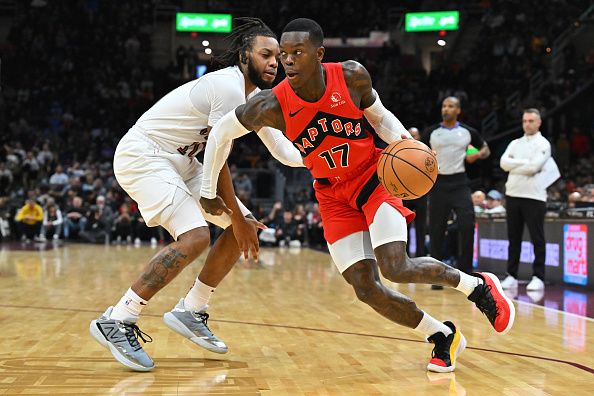 CLEVELAND, OHIO - NOVEMBER 26: Dennis Schroder #17 of the Toronto Raptors drives to the basket around Darius Garland #10 of the Cleveland Cavaliers during the third quarter at Rocket Mortgage Fieldhouse on November 26, 2023 in Cleveland, Ohio. The Cavaliers defeated the Raptors 105-102. NOTE TO USER: User expressly acknowledges and agrees that, by downloading and or using this photograph, User is consenting to the terms and conditions of the Getty Images License Agreement. (Photo by Jason Miller/Getty Images)