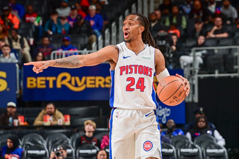 DETROIT, MI - OCTOBER 16: Daniss Jenkins #24 of the Detroit Pistons gestures to a teammate during the game on October 16, 2024 at Little Caesars Arena in Detroit, Michigan. NOTE TO USER: User expressly acknowledges and agrees that, by downloading and/or using this photograph, User is consenting to the terms and conditions of the Getty Images License Agreement. Mandatory Copyright Notice: Copyright 2024 NBAE (Photo by Chris Schwegler/NBAE via Getty Images)