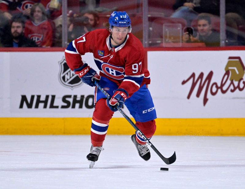 Sep 29, 2022; Montreal, Quebec, CAN; Montreal Canadiens forward Joshua Roy (97) plays the puck during the first period of the game against the Winnipeg Jets at the Bell Centre. Mandatory Credit: Eric Bolte-USA TODAY Sports