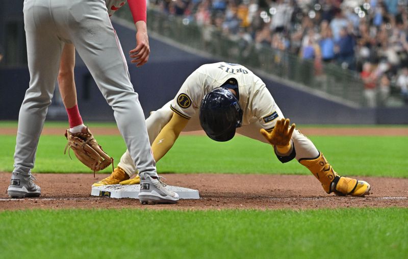 Sep 16, 2024; Milwaukee, Wisconsin, USA; Milwaukee Brewers third base Joey Ortiz (3) celebrates hitting a triple against the Philadelphia Phillies in the sixth inning at American Family Field. Mandatory Credit: Michael McLoone-Imagn Images