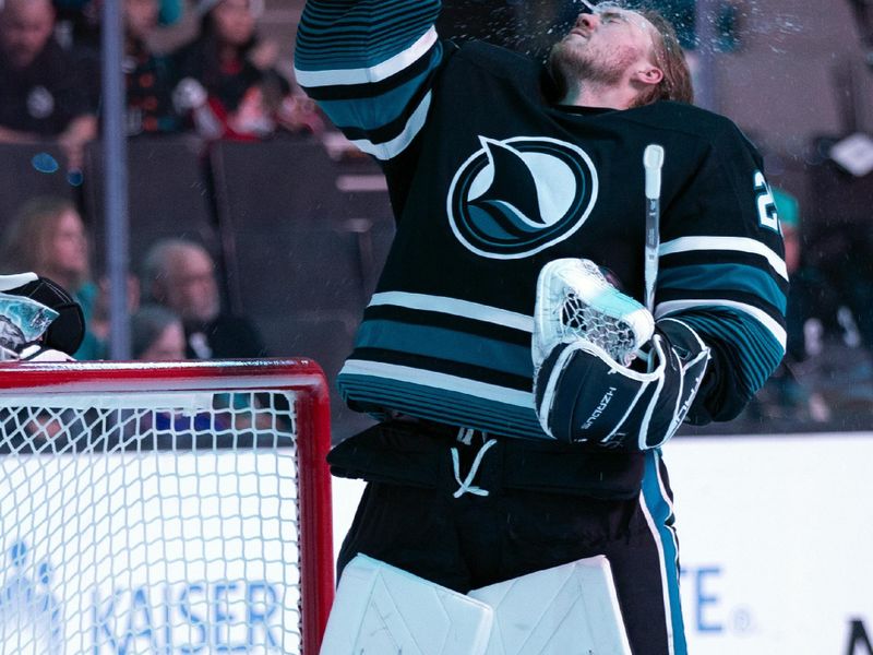 Oct 31, 2024; San Jose, California, USA; San Jose Sharks goaltender Mackenzie Blackwood (29) sprays himself with water before taking on the Chicago Blackhawks during the first period at SAP Center at San Jose. Mandatory Credit: D. Ross Cameron-Imagn Images