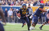 West Virginia Mountaineers vs Cincinnati Bearcats: Spotlight on Garrett Greene's Stellar Perform...