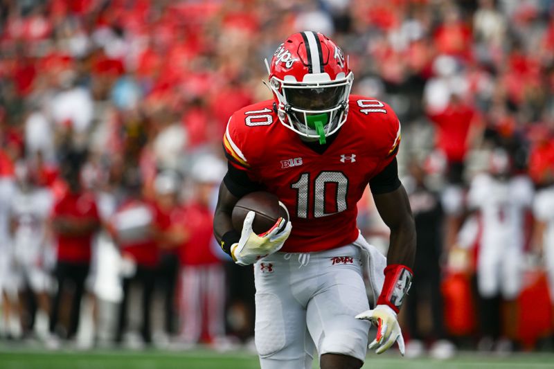 Sep 30, 2023; College Park, Maryland, USA; Maryland Terrapins wide receiver Tai Felton (10) runs for a touchdown during the first half against the Indiana Hoosiers  at SECU Stadium. Mandatory Credit: Tommy Gilligan-USA TODAY Sports