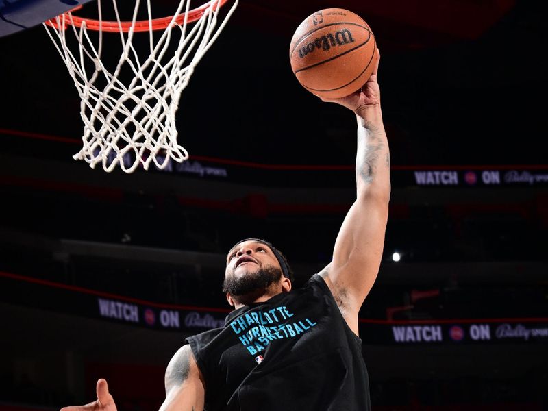 DETROIT, MI - MARCH 11: Miles Bridges #0 of the Charlotte Hornets warms up before the game against the Detroit Pistons on March 11, 2024 at Little Caesars Arena in Detroit, Michigan. NOTE TO USER: User expressly acknowledges and agrees that, by downloading and/or using this photograph, User is consenting to the terms and conditions of the Getty Images License Agreement. Mandatory Copyright Notice: Copyright 2024 NBAE (Photo by Chris Schwegler/NBAE via Getty Images)