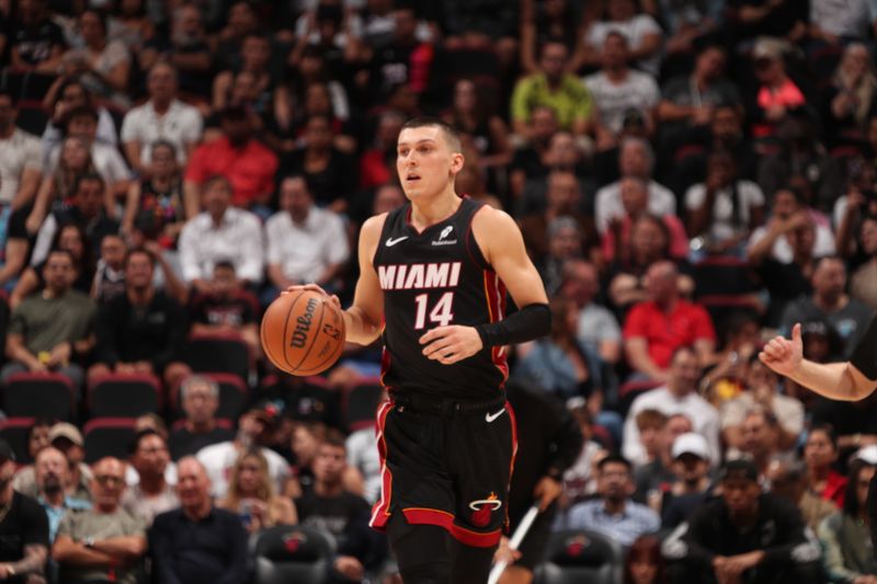 MIAMI, FL - NOVEMBER 4: Tyler Herro #14 of the Miami Heat dribbles the ball during the game against the Sacramento Kings  during a regular season game on November 4, 2024 at Kaseya Center in Miami, Florida. NOTE TO USER: User expressly acknowledges and agrees that, by downloading and or using this Photograph, user is consenting to the terms and conditions of the Getty Images License Agreement. Mandatory Copyright Notice: Copyright 2024 NBAE (Photo by Issac Baldizon/NBAE via Getty Images)