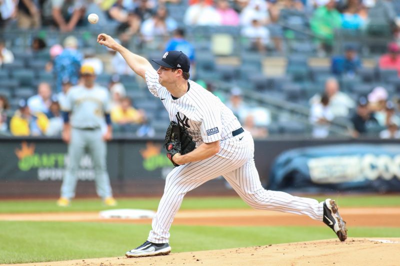 Sep 10, 2023; Bronx, New York, USA;  New York Yankees starting pitcher Gerrit Cole (45) pitches in the first inning against the Milwaukee Brewers at Yankee Stadium. Mandatory Credit: Wendell Cruz-USA TODAY Sports