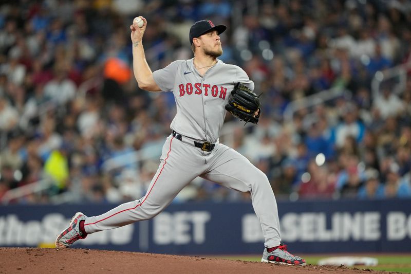 Sep 23, 2024; Toronto, Ontario, CAN; Boston Red Sox starting pitcher Tanner Houck (89) pitches to the Toronto Blue Jays during the second inning at Rogers Centre. Mandatory Credit: John E. Sokolowski-Imagn Images